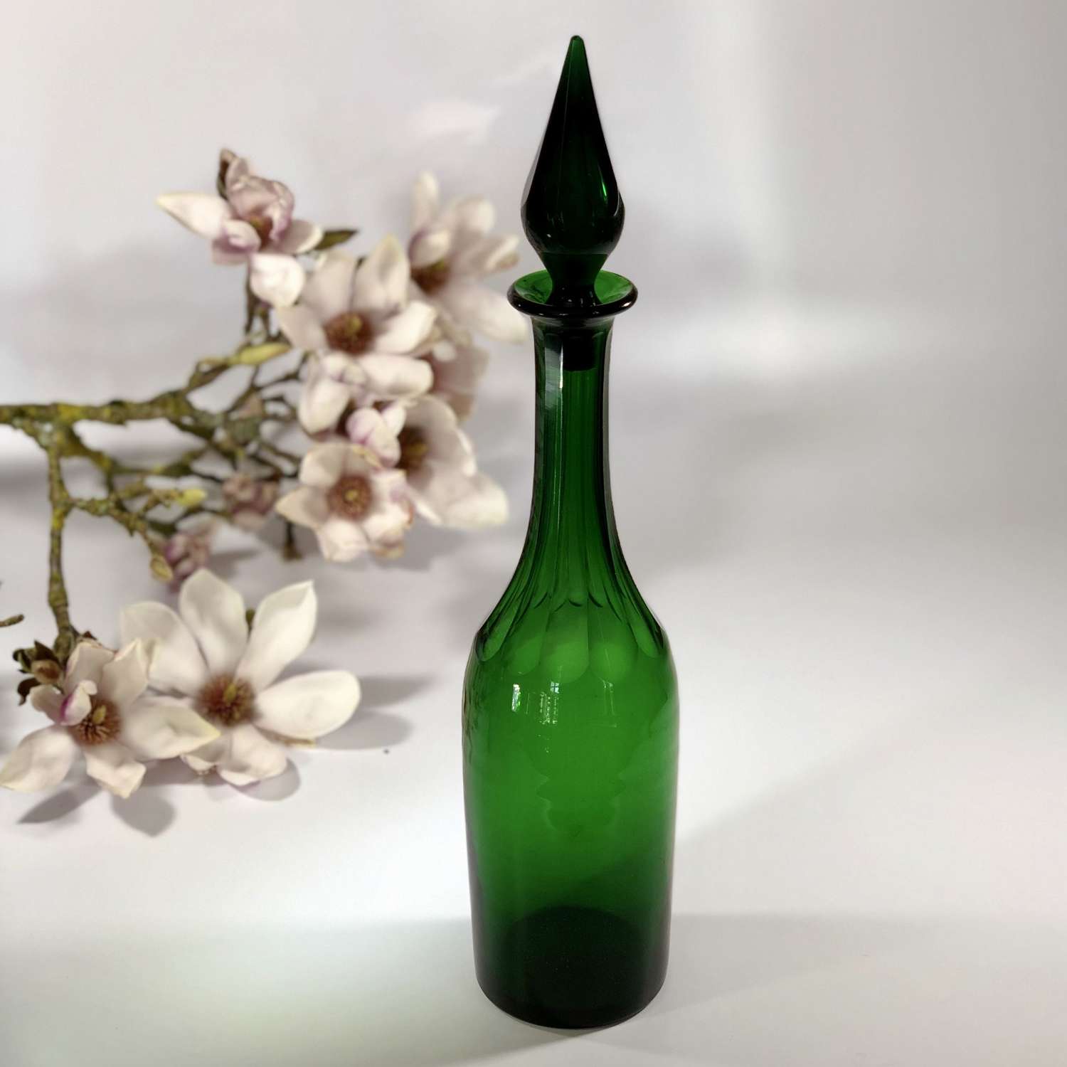 Tall green slice cut Victorian glass decanter