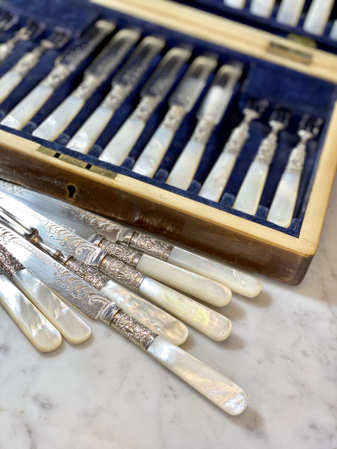 Edwardian silver and mother of pearl cutlery canteen for 12