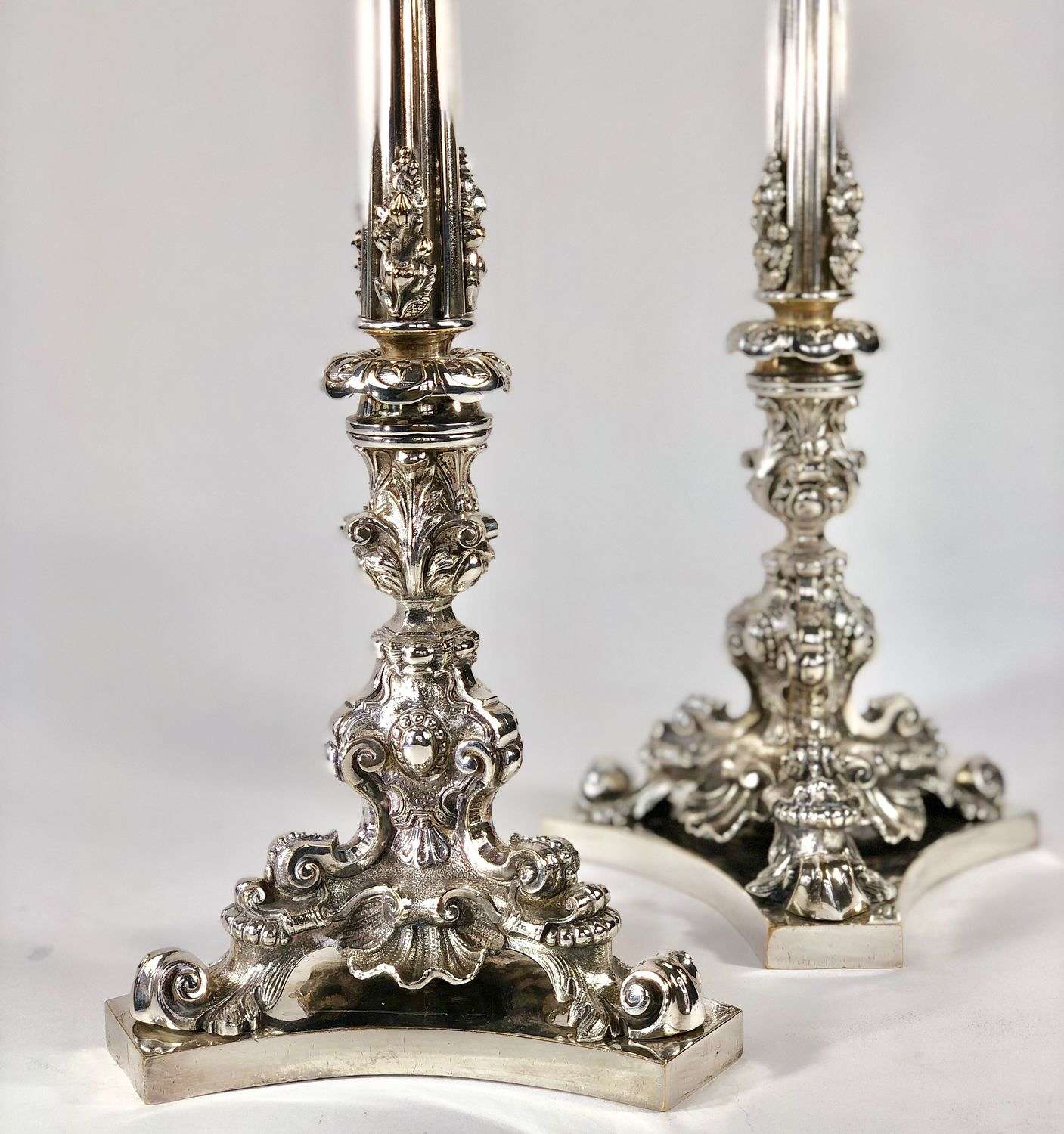 Striking pair of tall Victorian silver plated candlesticks