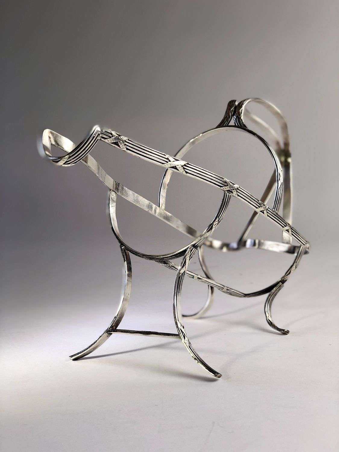 French early 20th Century silver plated wine cradle