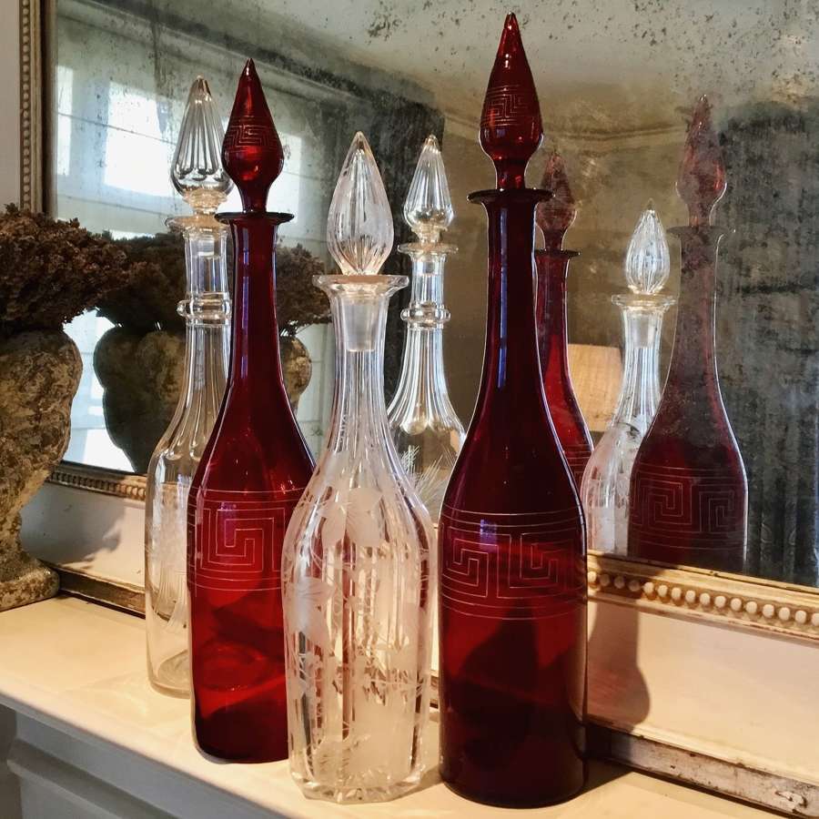 Pair of Victorian ruby glass and gilded decanters