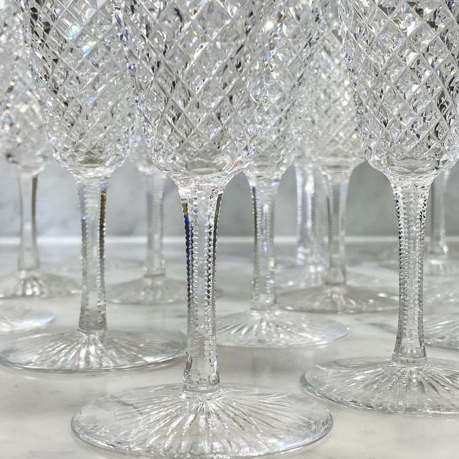 Extensive set of 16 early 20th Century diamond cut fluted glasses