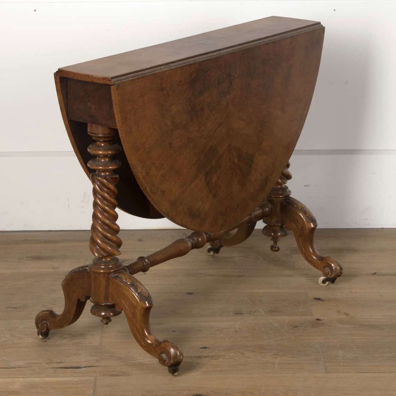 19th Century oval drop leaf walnut veneer table