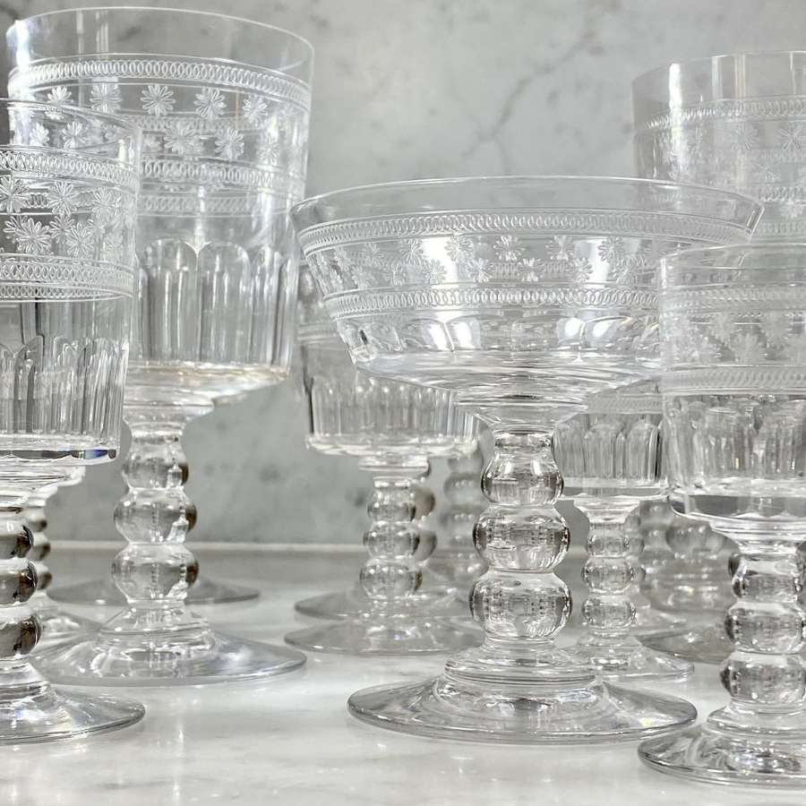 Collection of 19 early 20th C etched Baccarat drinking glassware