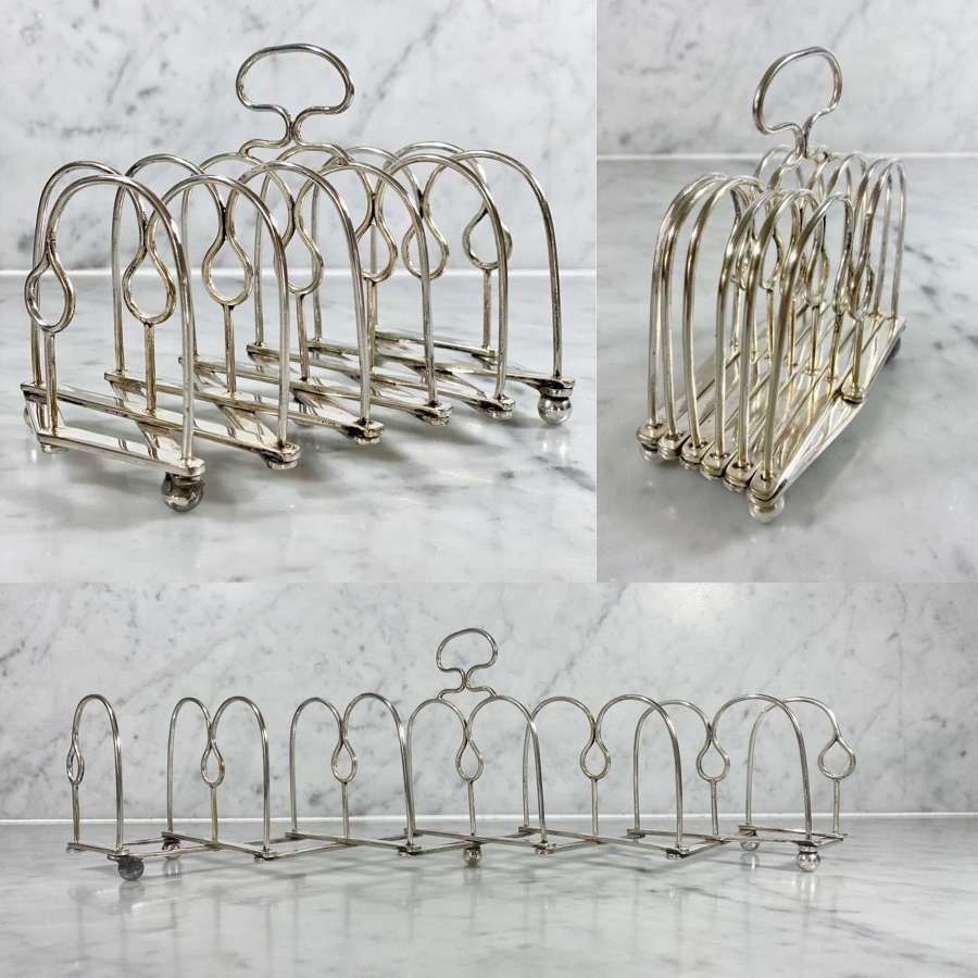 Unusual Victorian expanding silver plated toast rack