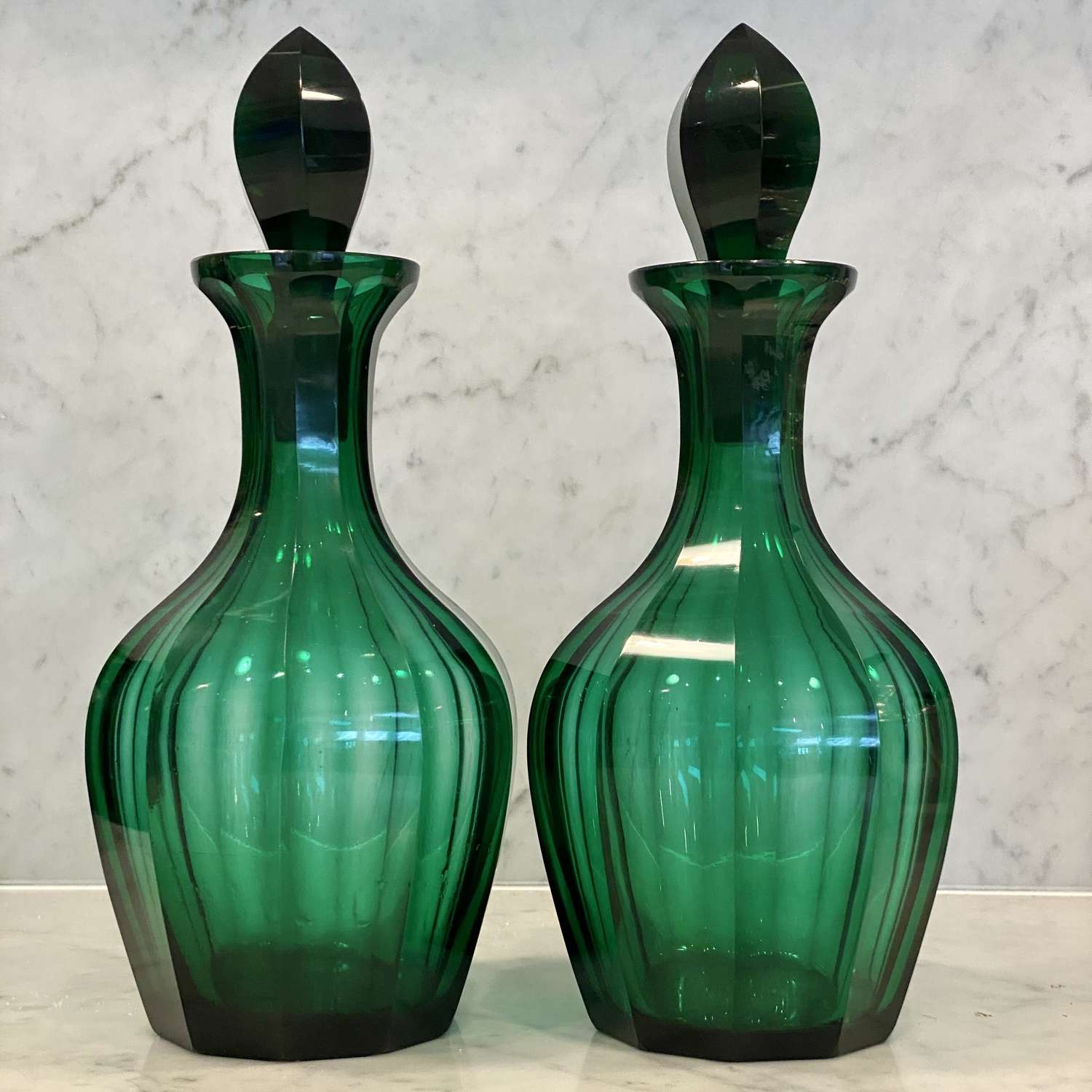 Pair of Victorian green glass Magnum decanters