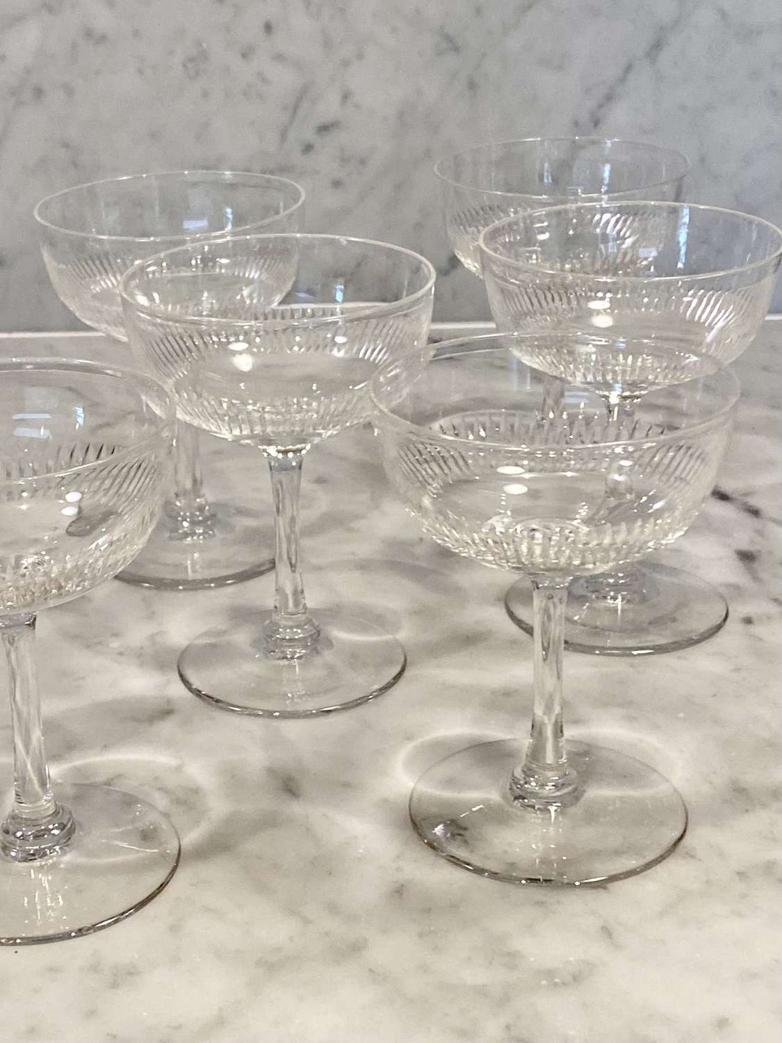 Charming set of six Edwardian cut crystal champagne coupes