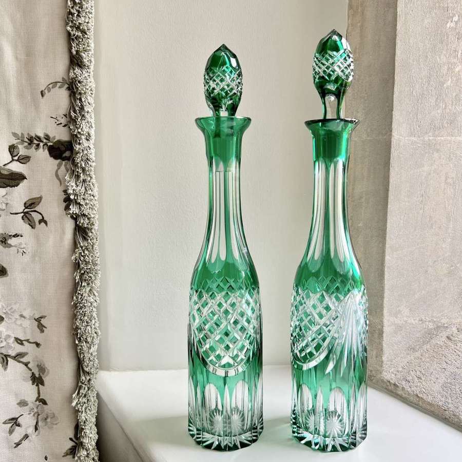 Pair of Victorian cut to clear emerald green glass decanters