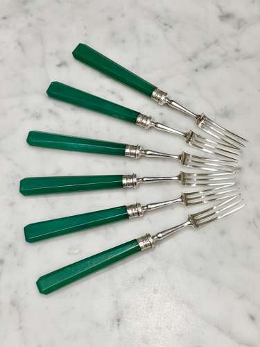 Art Deco silver dessert forks with emerald green handles