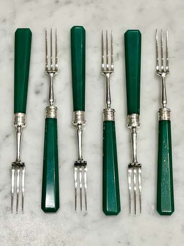 Art Deco silver dessert forks with emerald green handles