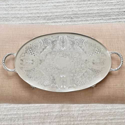 Pretty hand chased twin handled serving tray Circa 1950