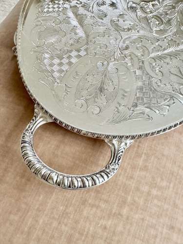 Pretty hand chased twin handled serving tray Circa 1950