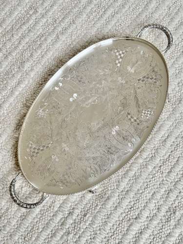 Pretty hand chased twin handled serving tray Circa 1950
