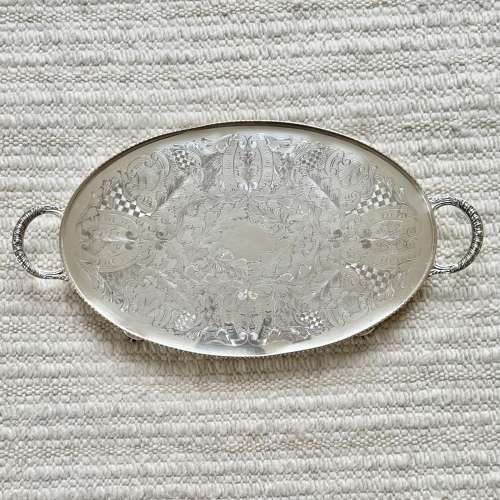 Pretty hand chased twin handled serving tray Circa 1950