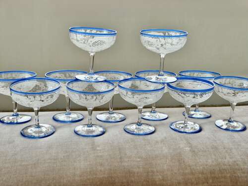 6 Art Deco etched champagne coupes with blue enamel rims