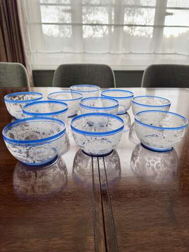 An outstanding set of a ten Art Deco wheel etched glass bowls hand applied blue e