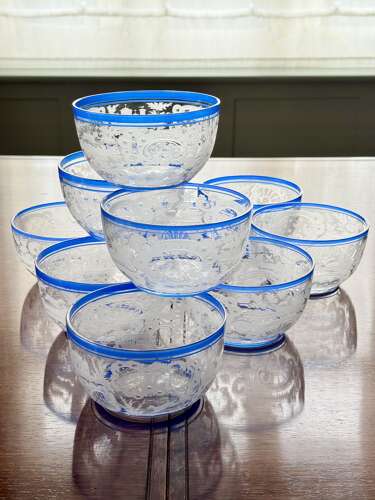 An outstanding set of a ten Art Deco wheel etched glass bowls hand applied blue e