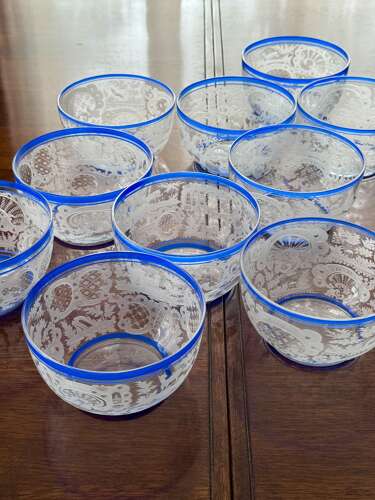 An outstanding set of a ten Art Deco wheel etched glass bowls hand applied blue e