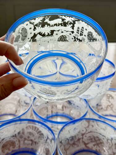 An outstanding set of a ten Art Deco wheel etched glass bowls hand applied blue e