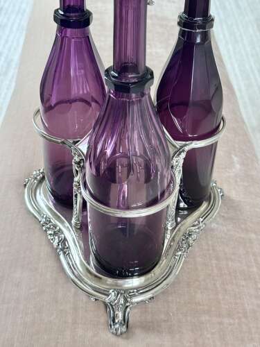 Early Victorian Triple amethyst decanters and silver plated stand dated 1839