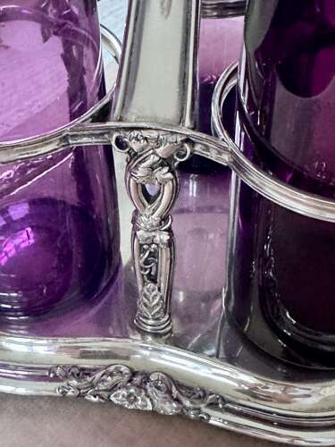 Early Victorian Triple amethyst decanters and silver plated stand dated 1839